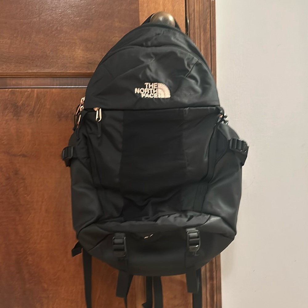north face black and rose gold recon backpack
